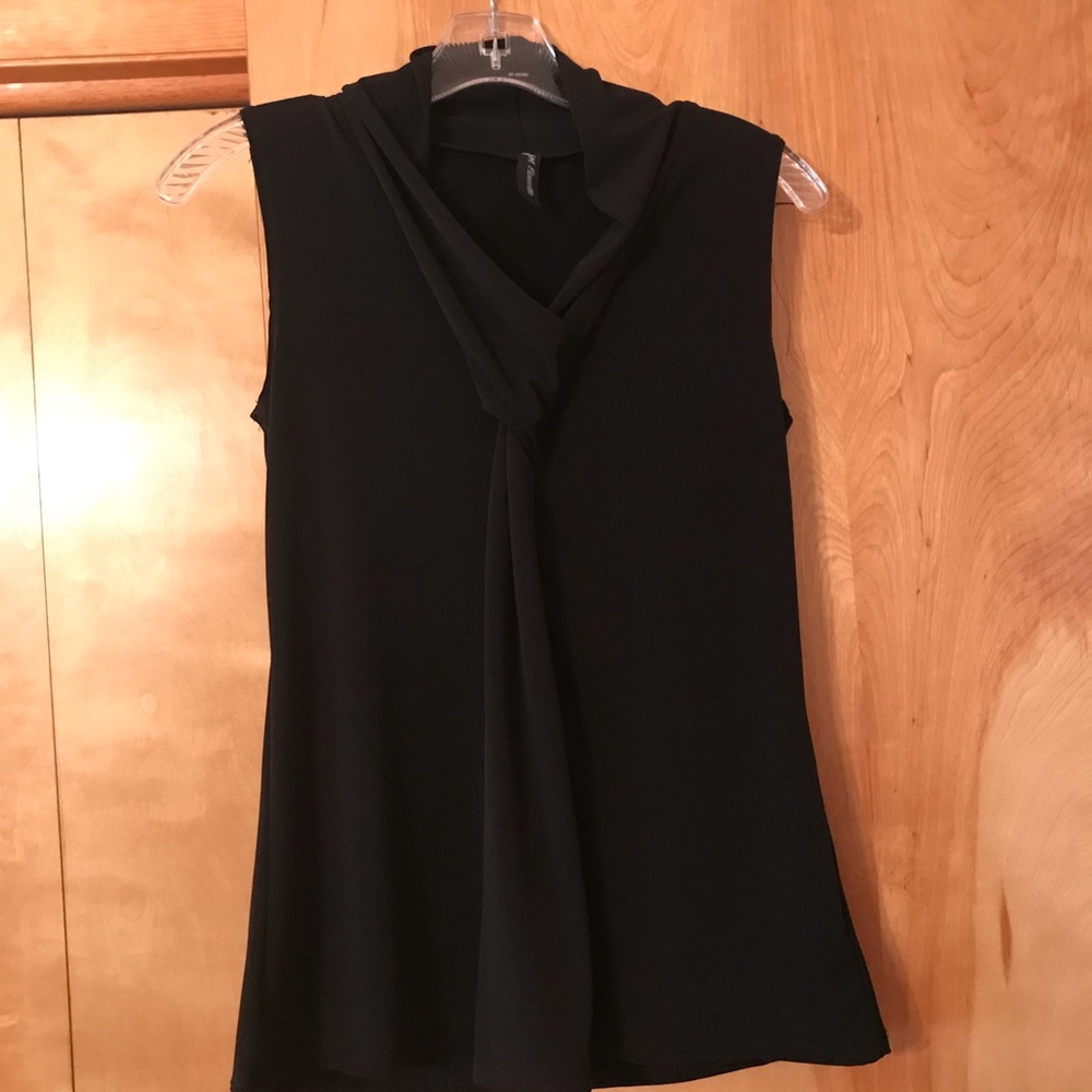 Black tank top. Great for under a blazer !
